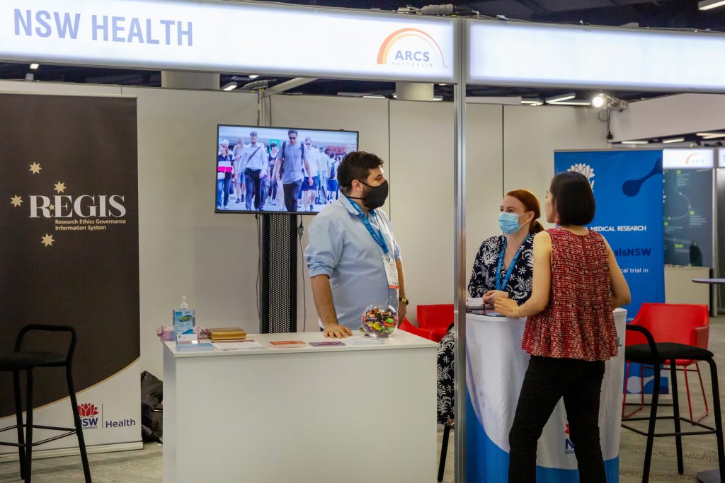 Staff at the Office for Health and Medical Research booth